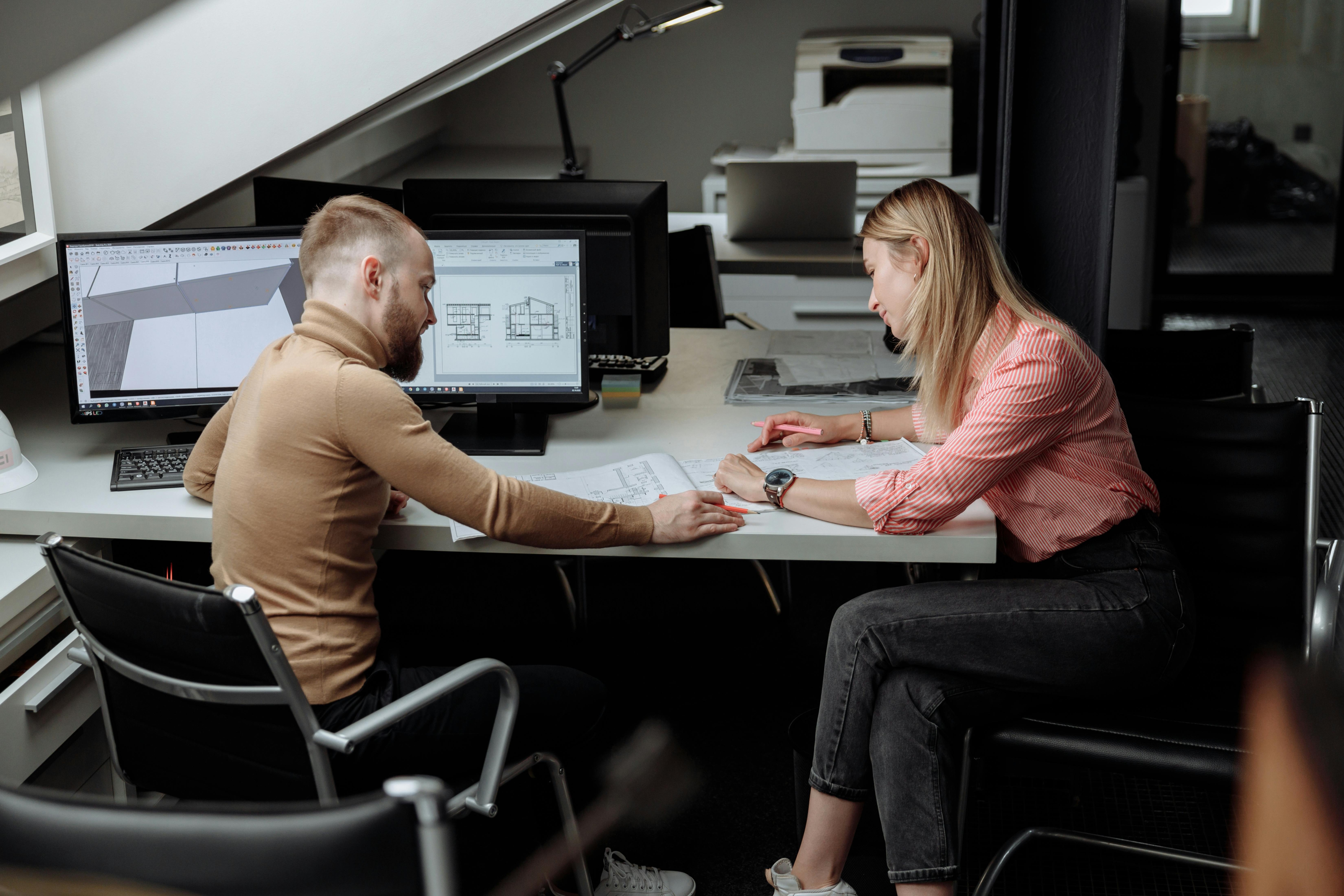  An architectural firm meeting to calculate and reduce their business carbon footprint